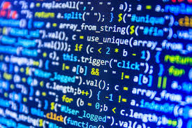 Code displayed on a laptop
